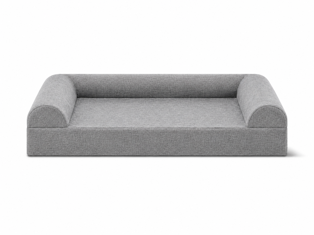 Front view of a gray three-sided sofa-style orthopedic dog bed