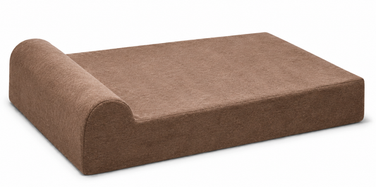 Angled view of a brown headrest orthopedic dog bed