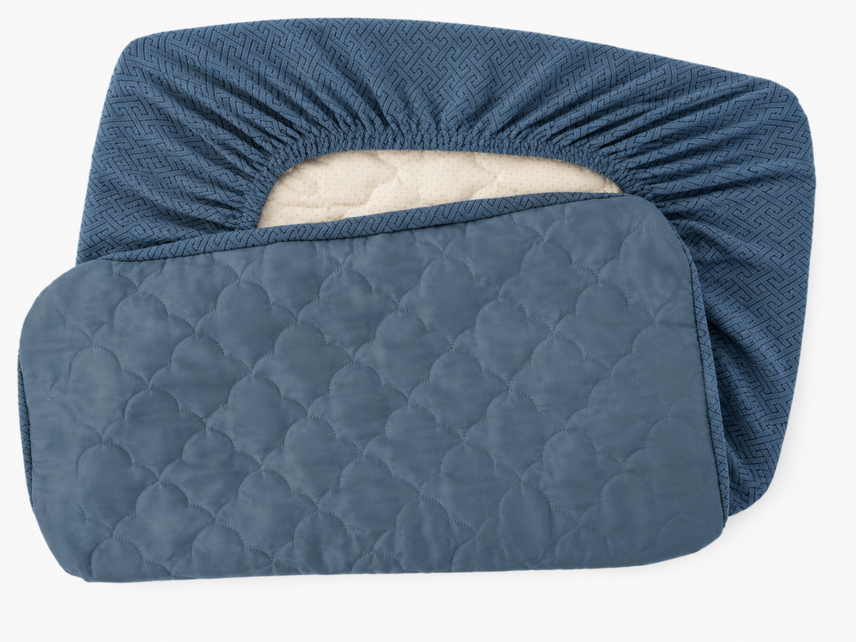 Blue replacement dog bed cover shown opened to display the removable cover