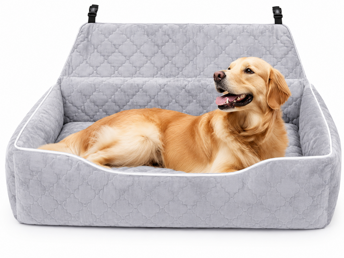 Golden Retriever resting in gray cushioned dog car bed