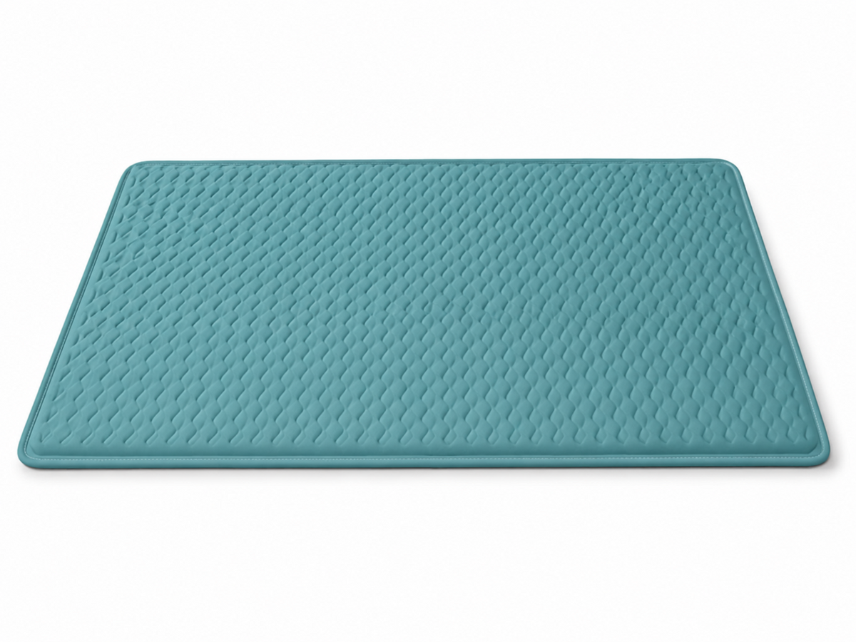 Teal DogAlign orthopedic dog crate pad on white background